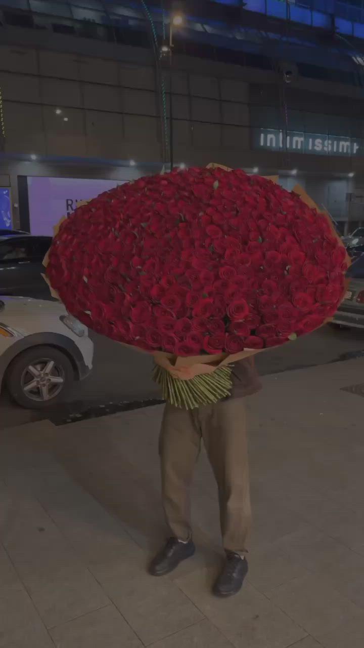 Professional floral arrangement in modern corporate setting